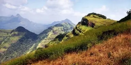 Misty Sahyadri hill viewpoint similar to the walking ridges around Matheran